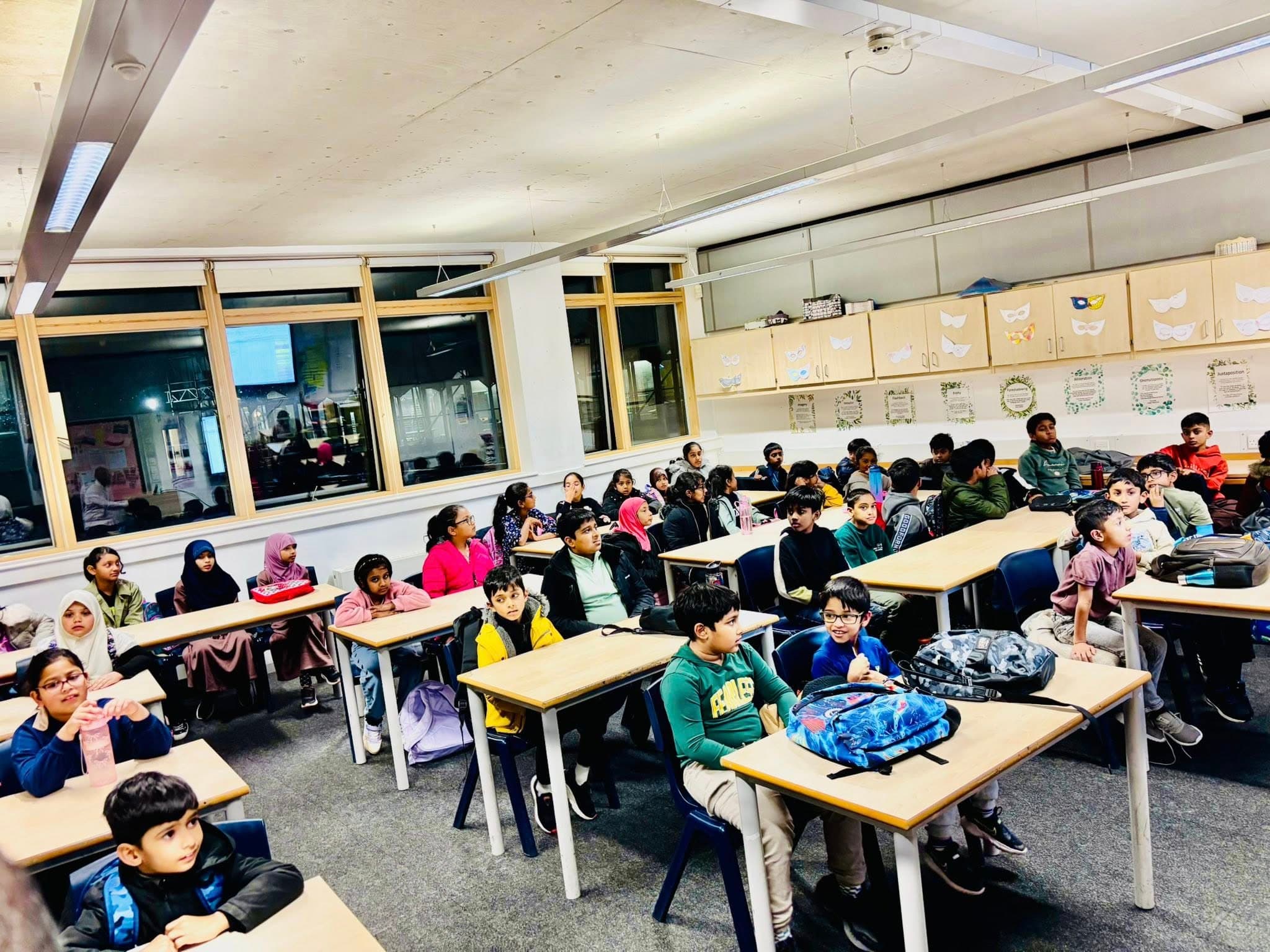 Students learning with teacher